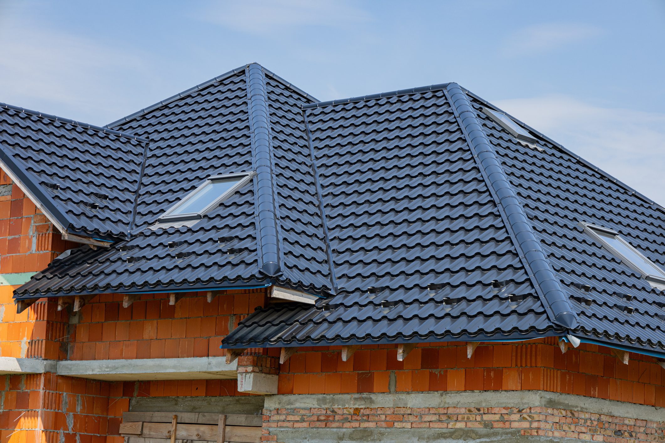 Modern house with dark roof tiles